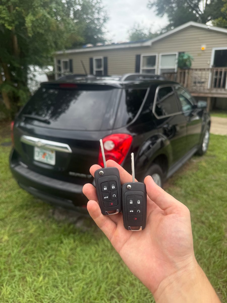 Two flip keys, cut and programmed for a Chevrolet Equinox, Azov Locksmith